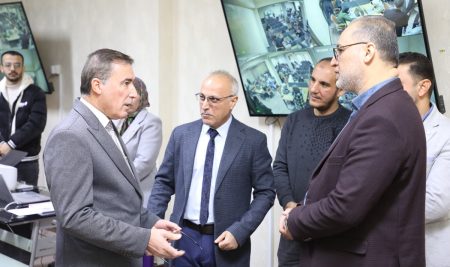 The President of the University of Diyala observes the Iraqi National English Language Test (INELT) at the Electronic Computer Center.